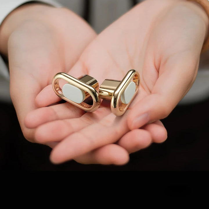 Gold Zinc Alloy Bar Pulls held in hand detail