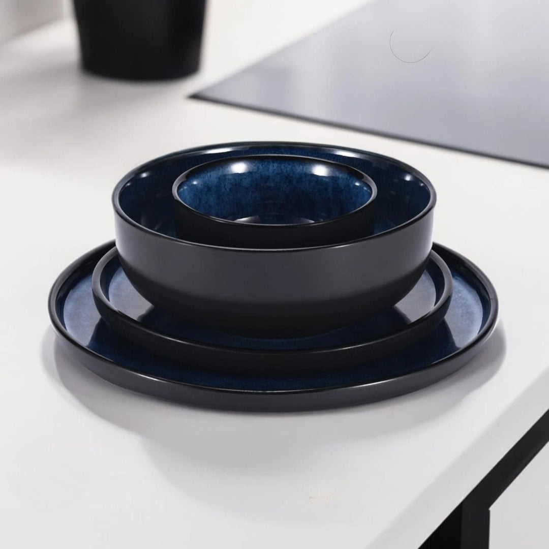 Dark Blue Ceramic Dinnerware Set stacked plates and bowls close-up