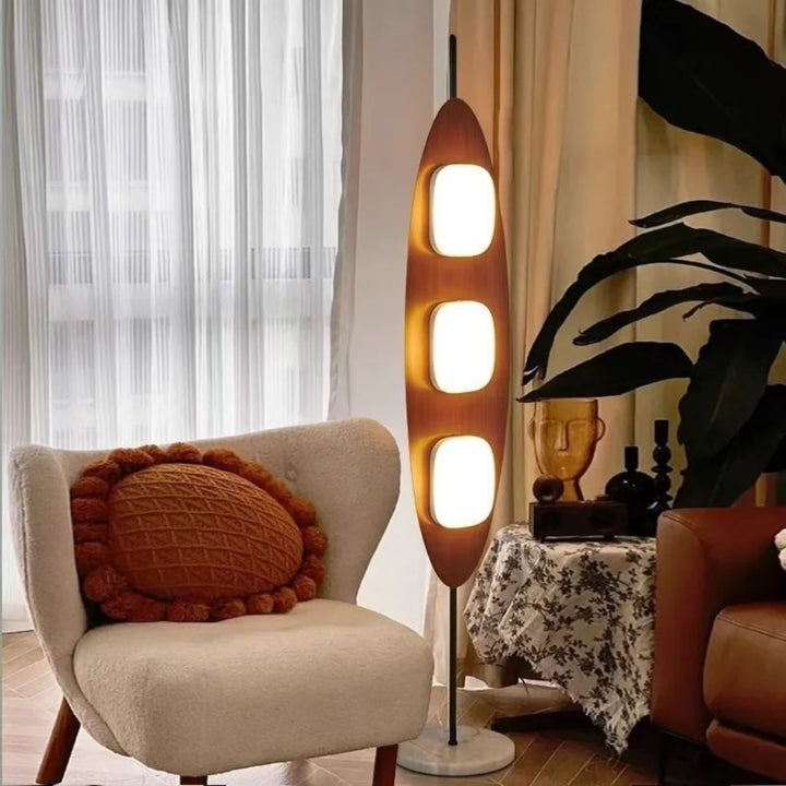 Walnut Yacht Silhouette Floor Lamp - full-length standing view in room setting