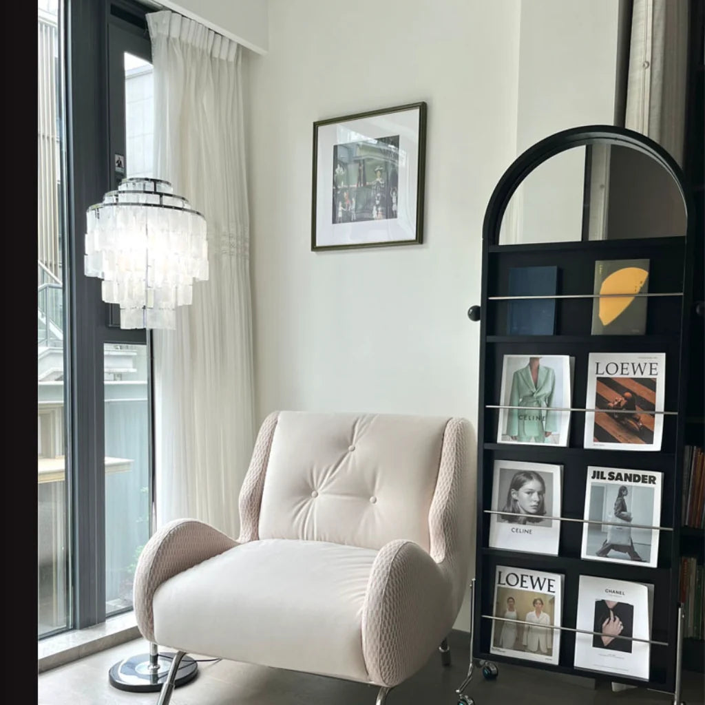 Capiz Shell Floor Lamp lit lifestyle by armchair