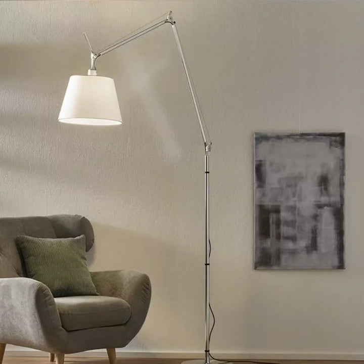 Industrial Swing Arm Floor Lamp beside armchair