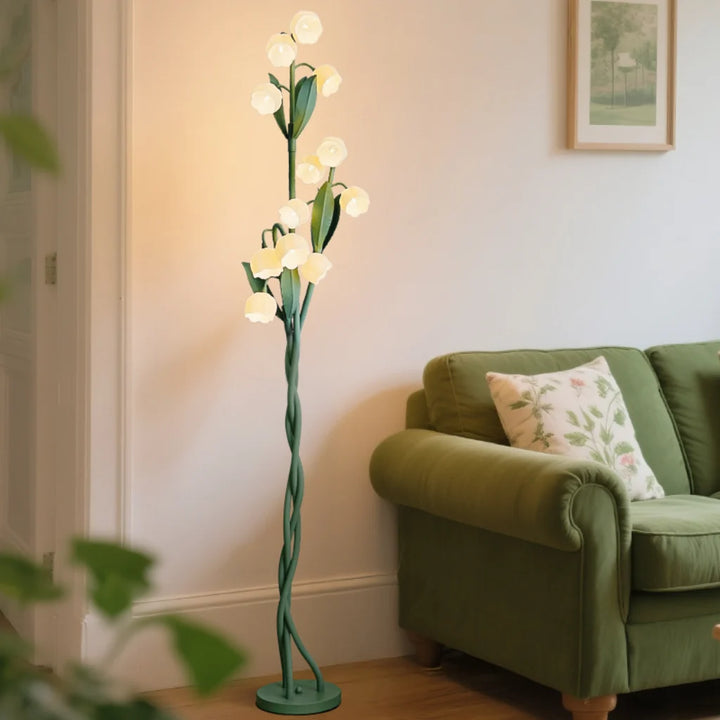Closeup of Lily Bloom Acrylic Floor Lamp flower petal shades and iron frame
