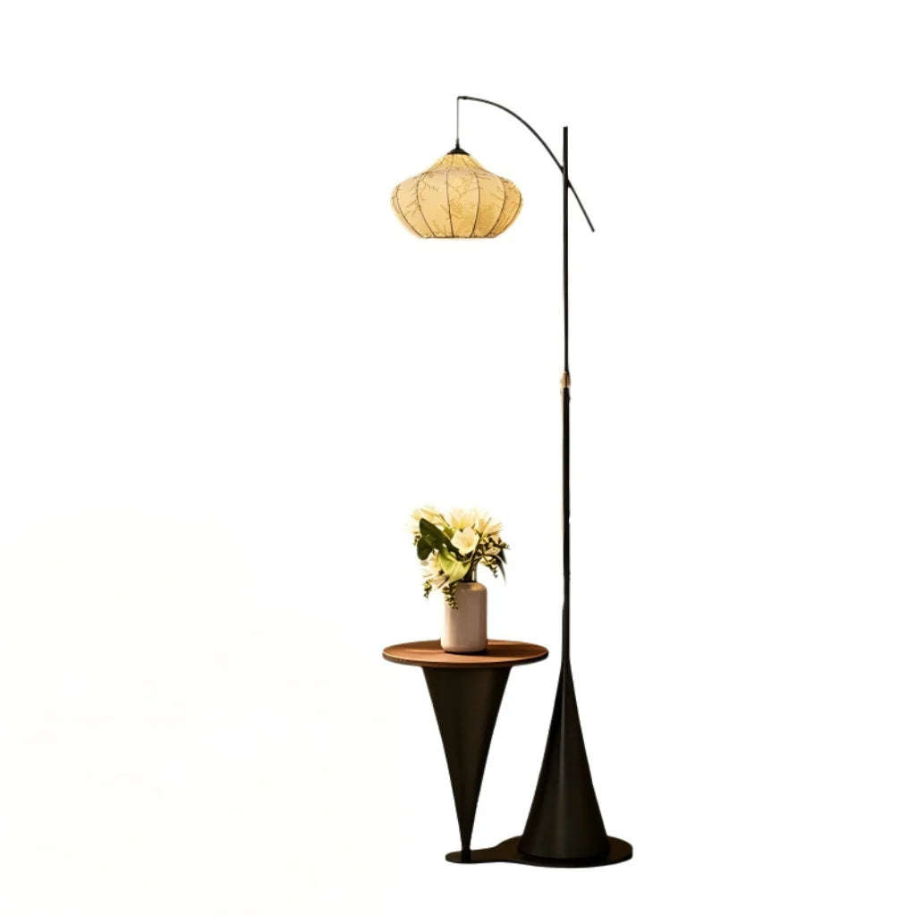 Artisan Wood Floor Lamp shown beside a sofa in a styled room