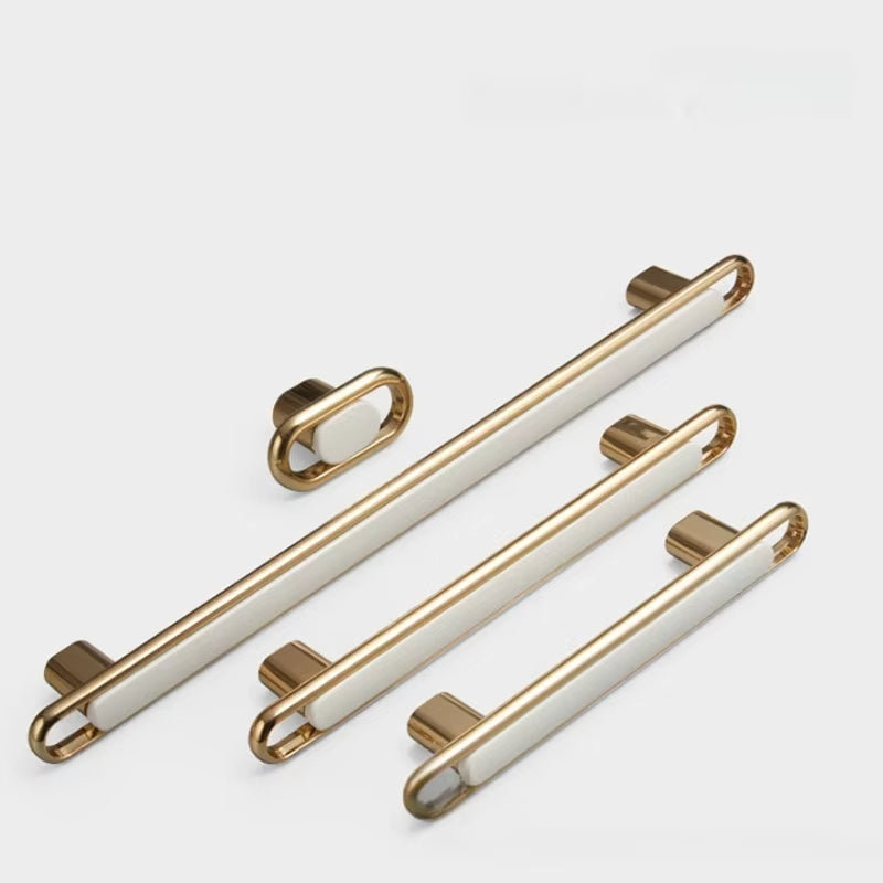 Gold Zinc Alloy Bar Pulls and knob flat lay detail