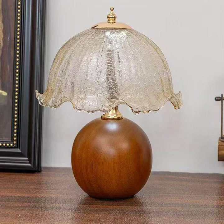 Gold Crackle Glass Flower Table Lamp Lit on Console Table