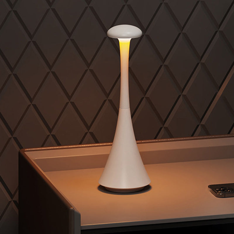 Cordless Hourglass Table Lamp lit on desk