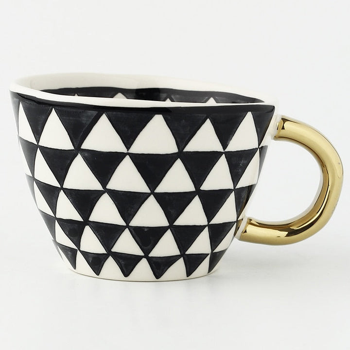 Artisan Glazed Ceramic Mug in hand lifestyle