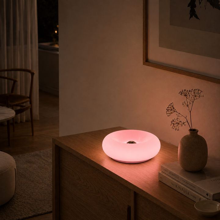 Round Sculptural Table Lamp on nightstand lifestyle