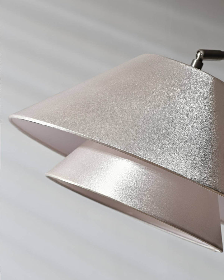 Close-up of a modern cylindrical lamp shade with a textured finish, perfect for minimalist or modern decor.