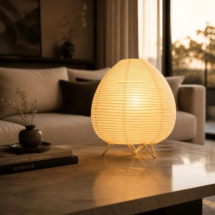 Round Washi Lantern Table Lamp lit at bedside