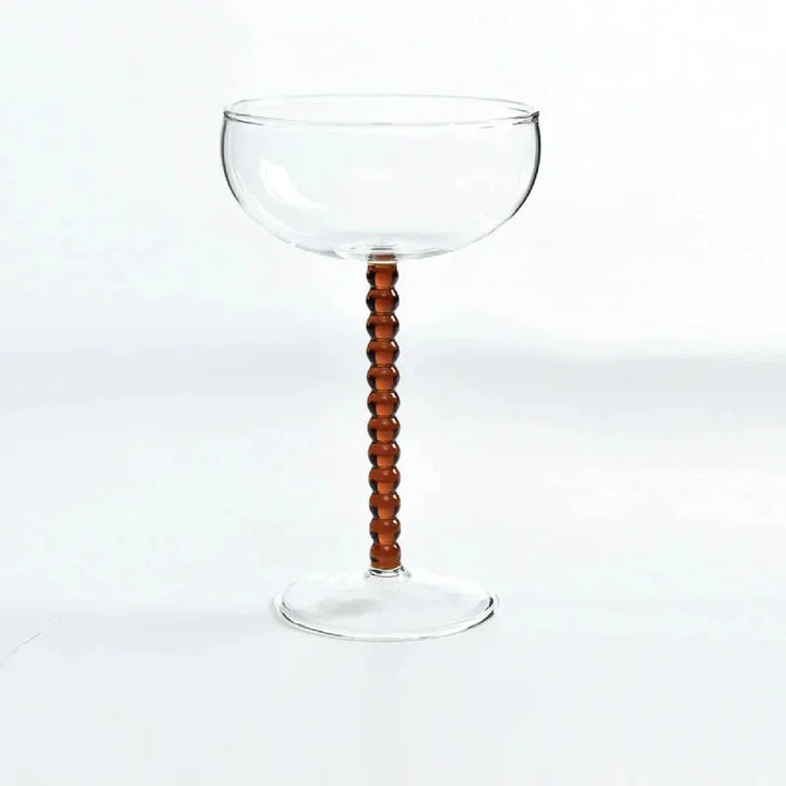 Brown Gilded Era Beaded Coupe Glass front view