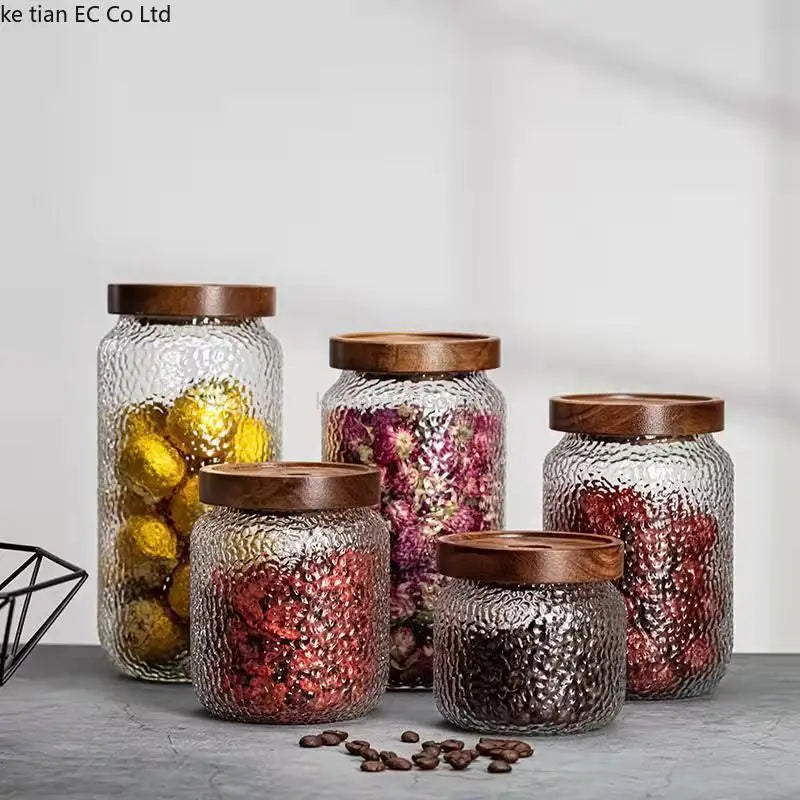 Hammered Glass Acacia Lid Jars size lineup on white background