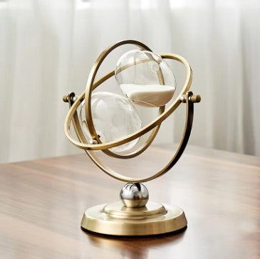 Metal Frame Hourglass Timer on desk