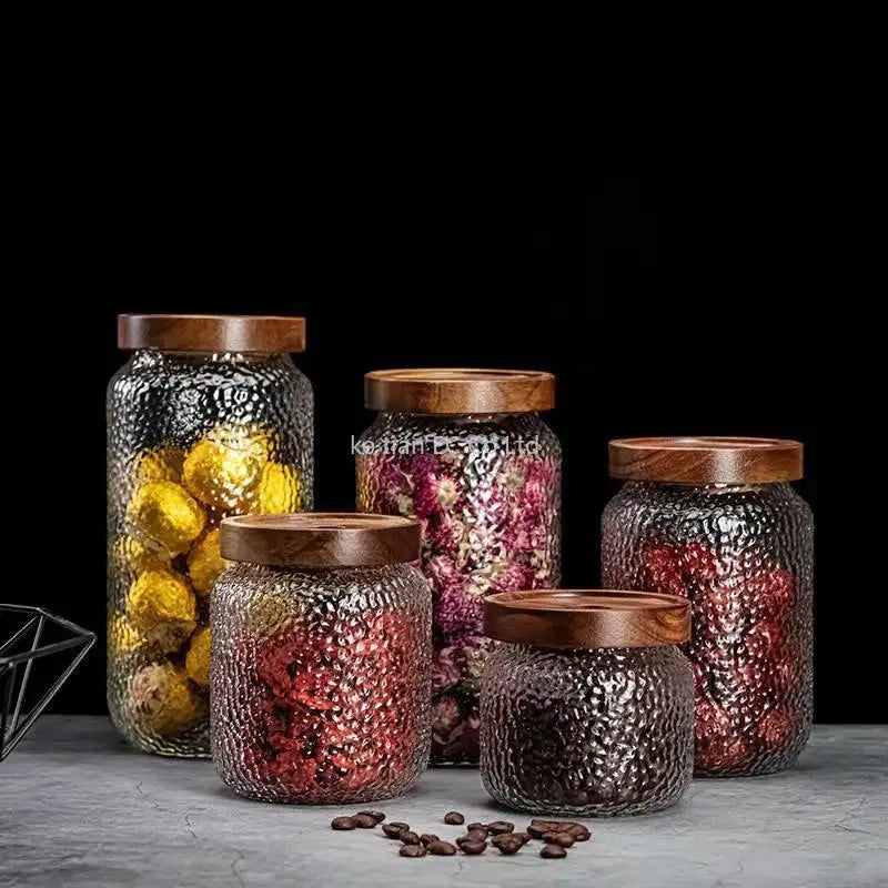 Hammered Glass Acacia Lid Jars in five sizes with dried botanicals