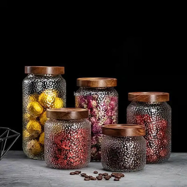 Hammered Glass Acacia Lid Jars in five sizes with dried botanicals
