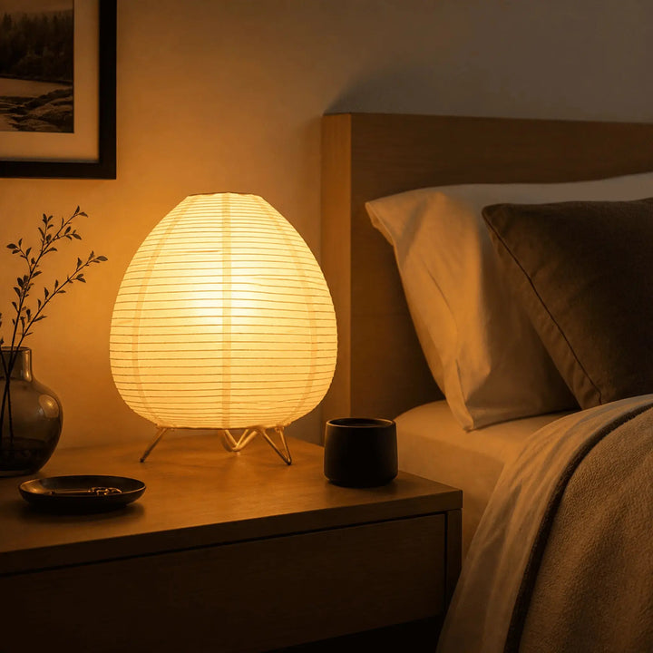 Washi Lantern Table Lamp glowing on a study desk