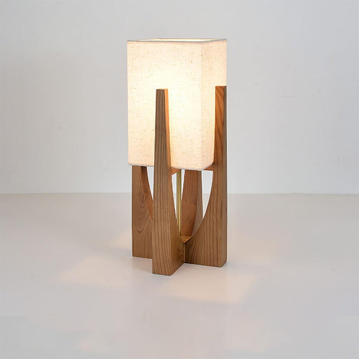 Mid-century wooden floor lamp with lantern-style shade, perfect for bedroom lighting.