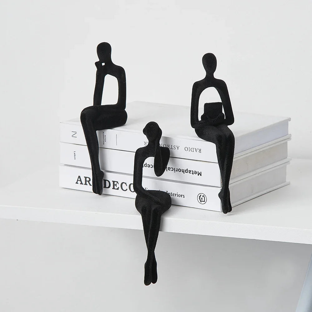 Black Abstract Thinker Shelf Sitter Figurines on books