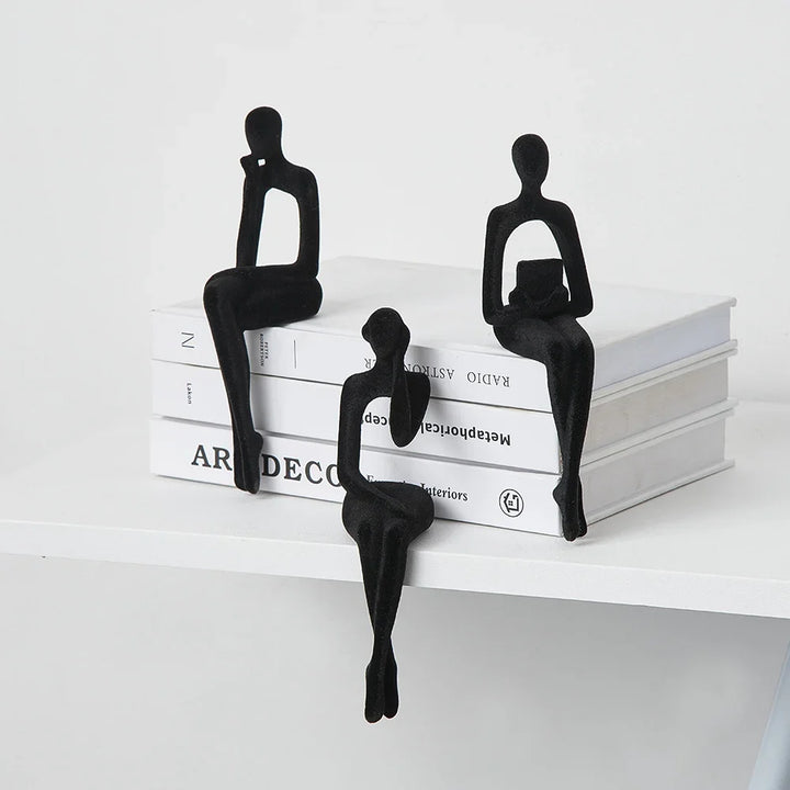 Black Abstract Thinker Shelf Sitter Figurines on books