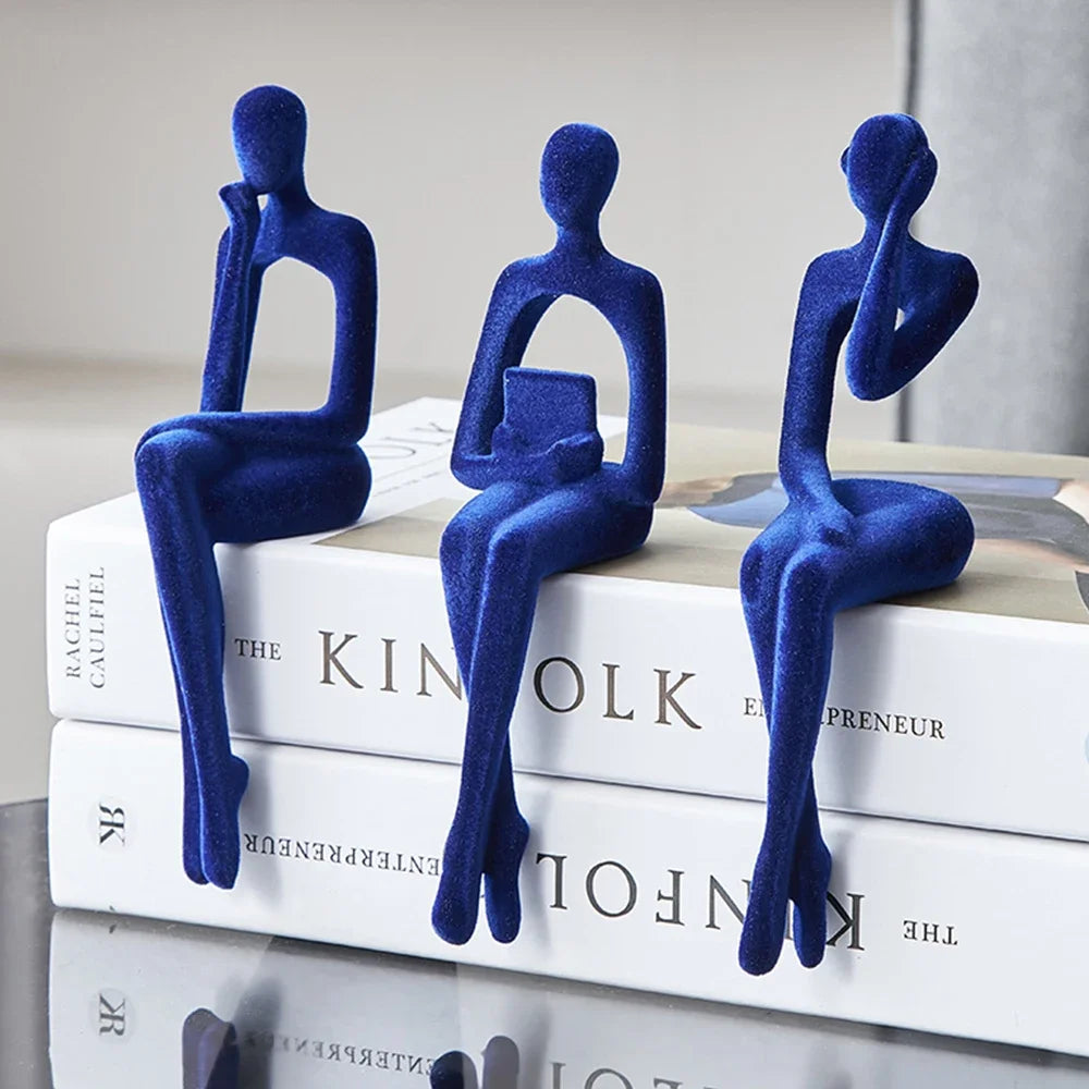 Blue Abstract Thinker Shelf Sitter Figurines on books