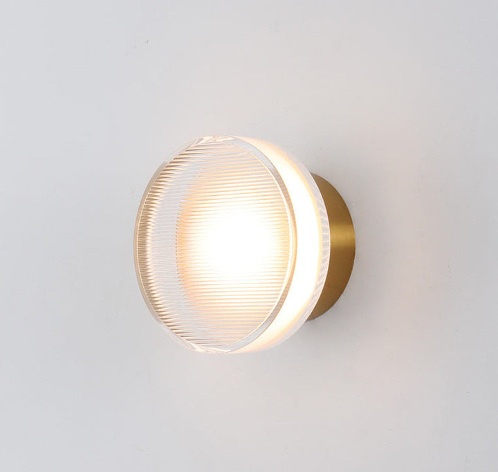 Acrylic Disc Wall Sconce installed on wall