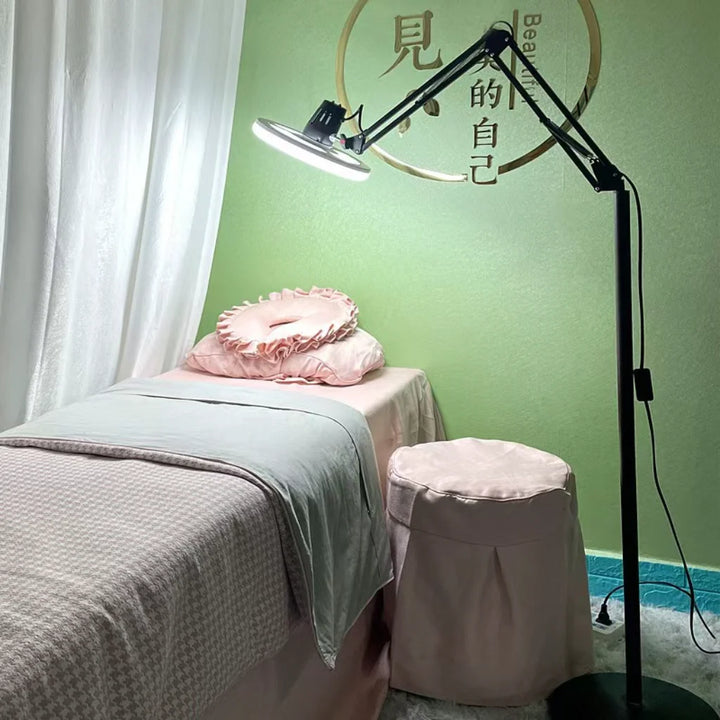 Black Adjustable LED Ring Floor Lamp in salon lifestyle setting