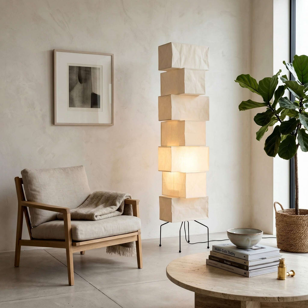 White Akari Paper Floor Lamp in a bright neutral reading corner
