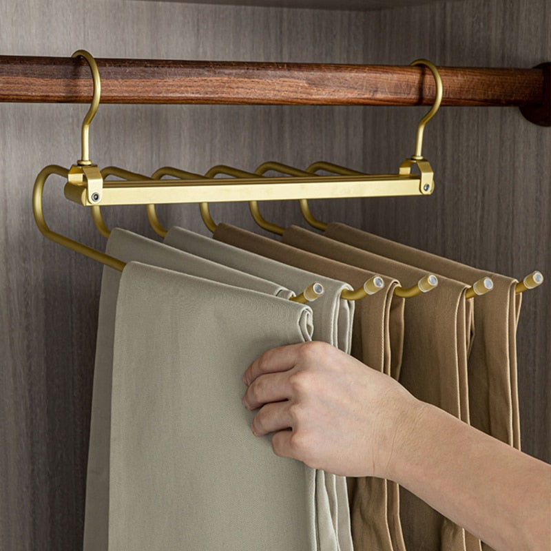 Gold Aluminum 6-Arm Swivel Pants Hanger in closet