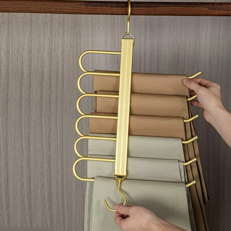 Gold Aluminum Pants Hanger folded vertical in closet