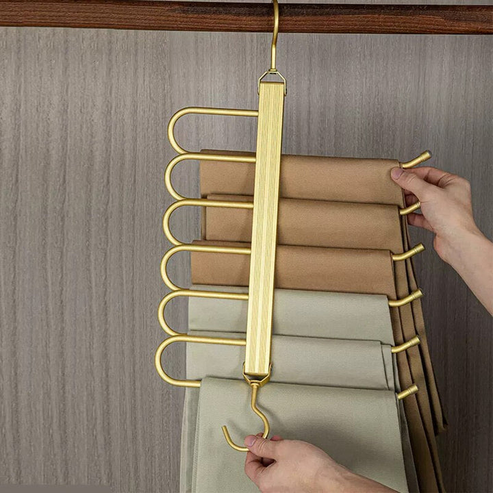 Gold Aluminum Pants Hanger folded vertical in closet