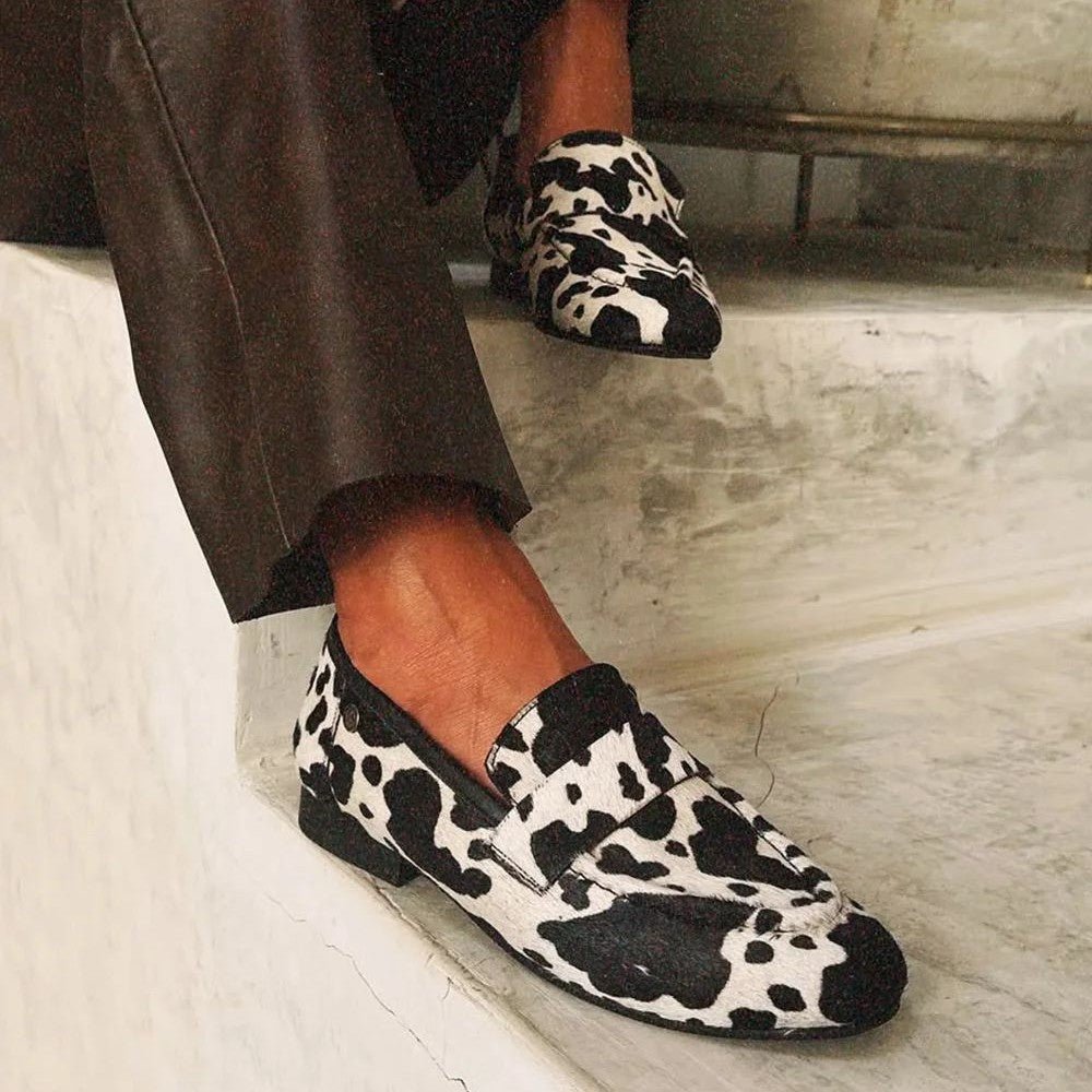 Black and White Animal Print Loafers side view worn