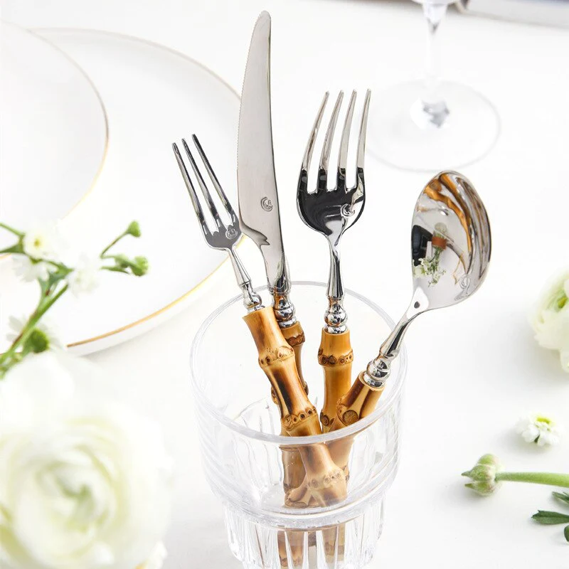 Bamboo Handle Stainless Steel Flatware Set in glass holder