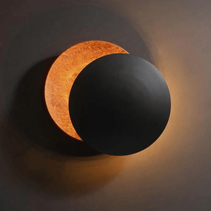 Black & Copper Black Eclipse LED Wall Lamp lit front view