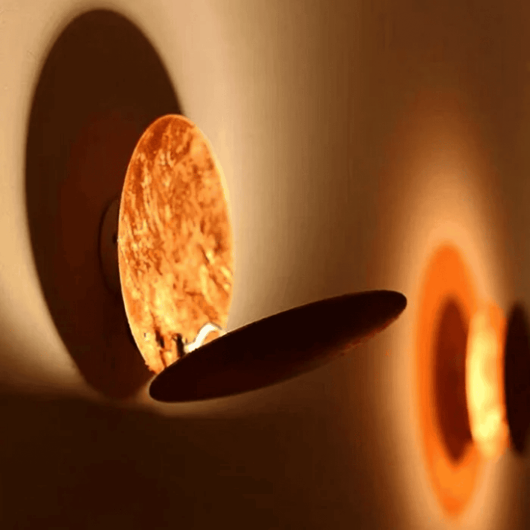 Black Eclipse LED Wall Lamp lit side view