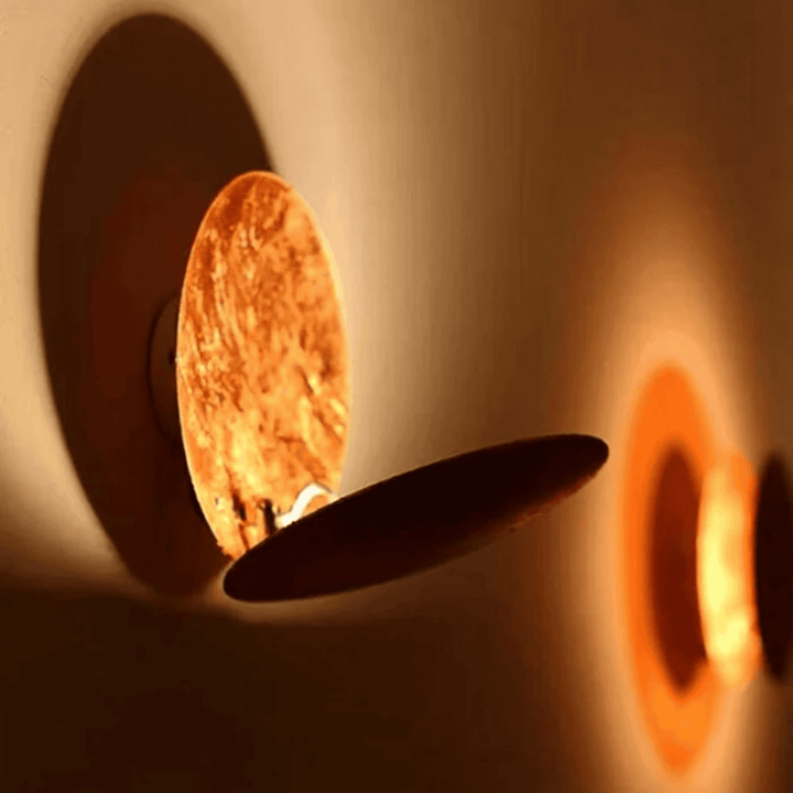 Black Eclipse LED Wall Lamp lit side view