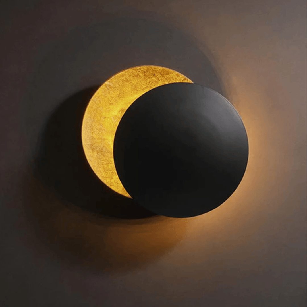 Black & Gold Black Eclipse LED Wall Lamp lit front view