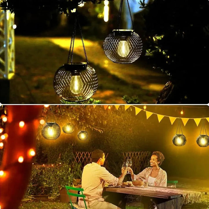 Black metal solar lantern with three-point chain and S-hook