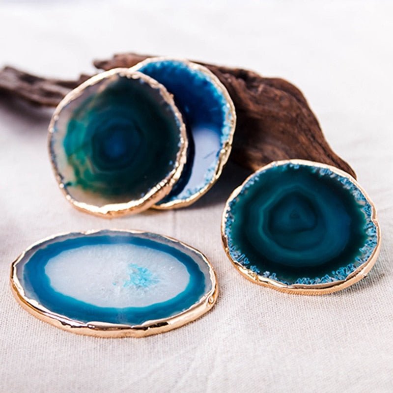 Blue Agate Stone Coasters with Gold Rim arranged on table