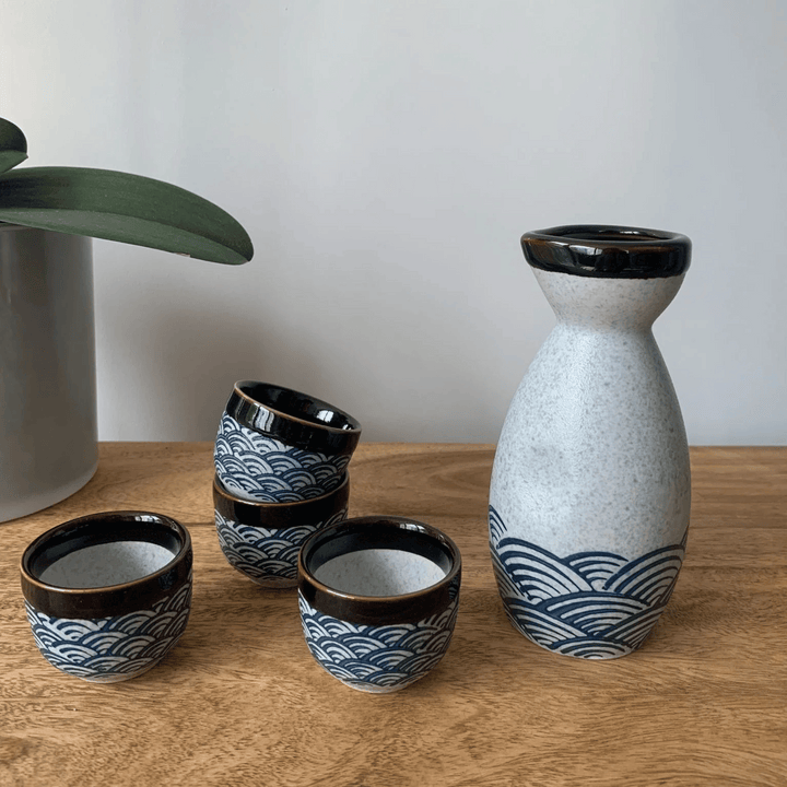 Blue Wave Ceramic Sake Set on wooden table
