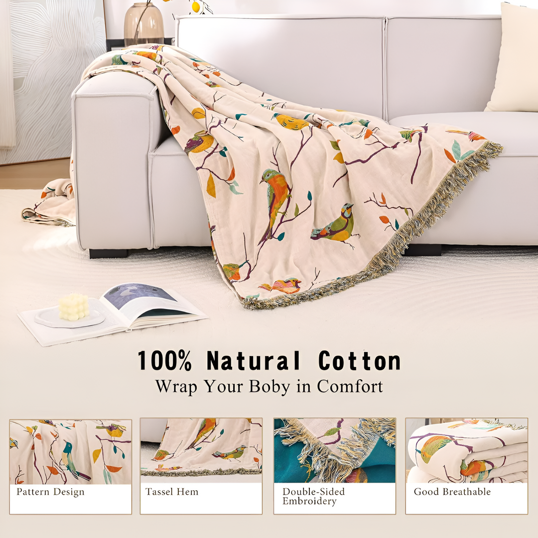Boho Bird Print Cotton Throw draped over a sofa