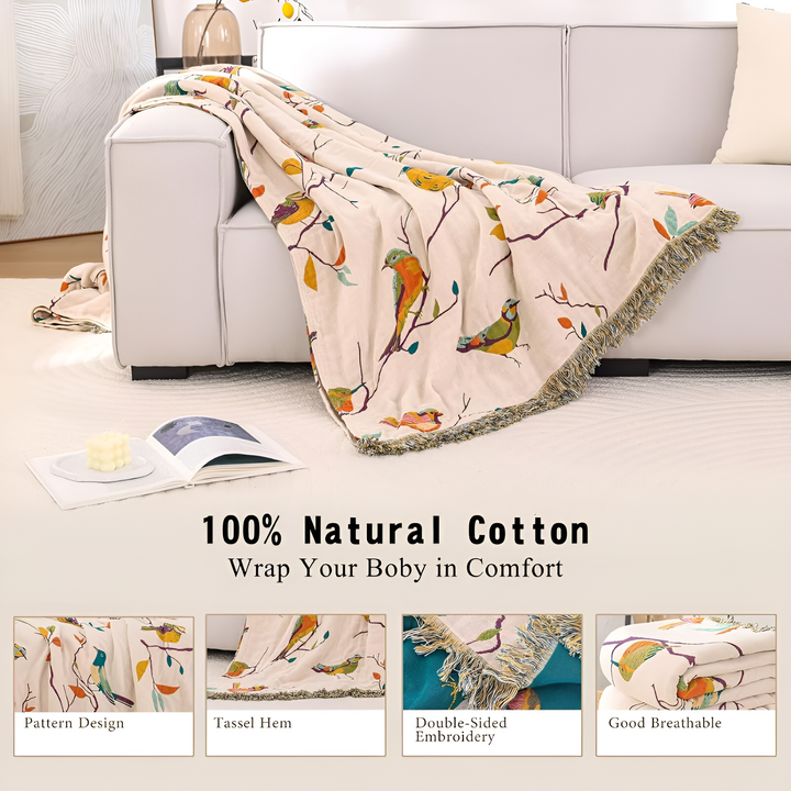 Boho Bird Print Cotton Throw draped over a sofa