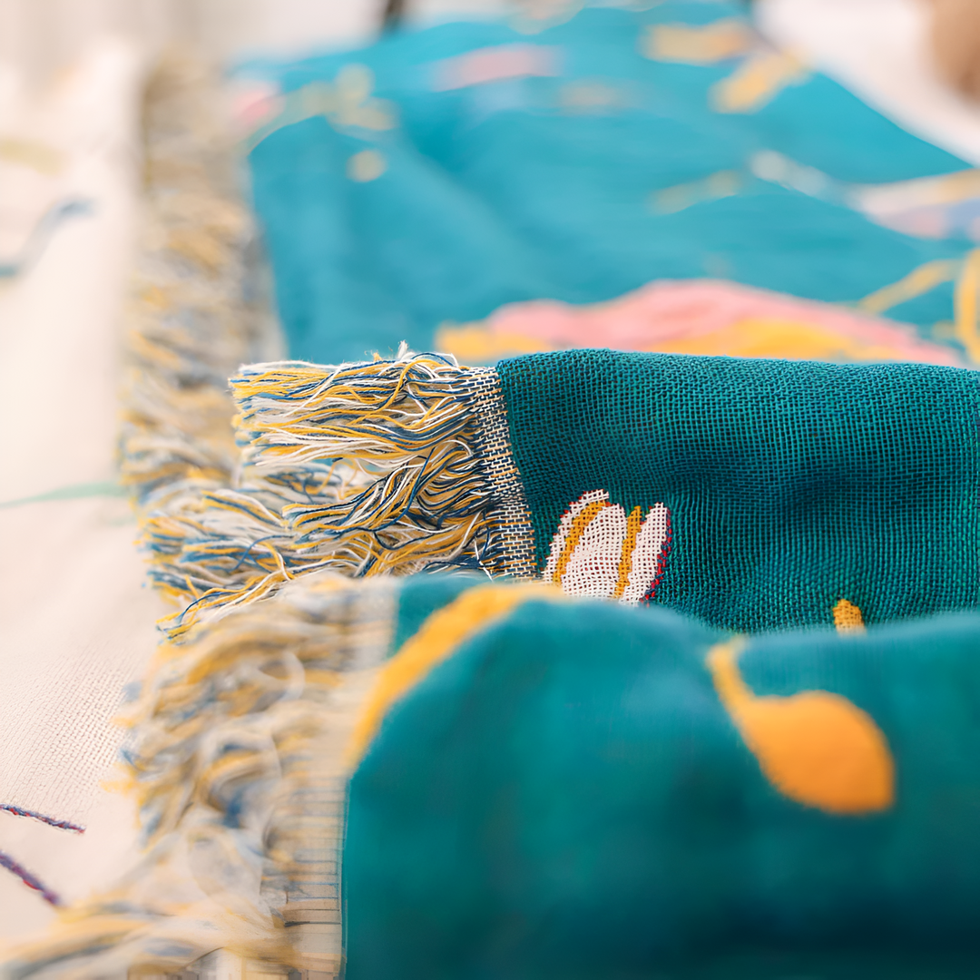 Boho Bird Print Cotton Throw fringe and weave close-up