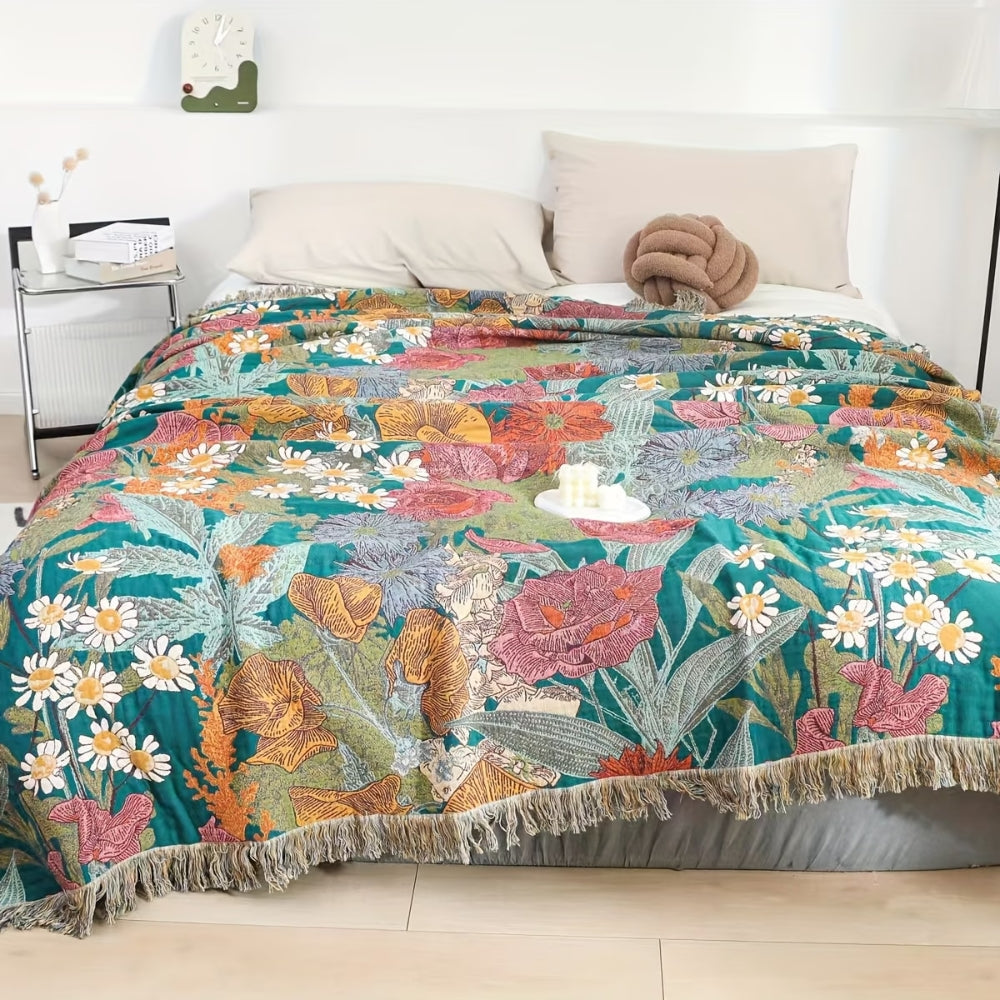 Boho Floral Tasseled Throw Blanket spread on bed