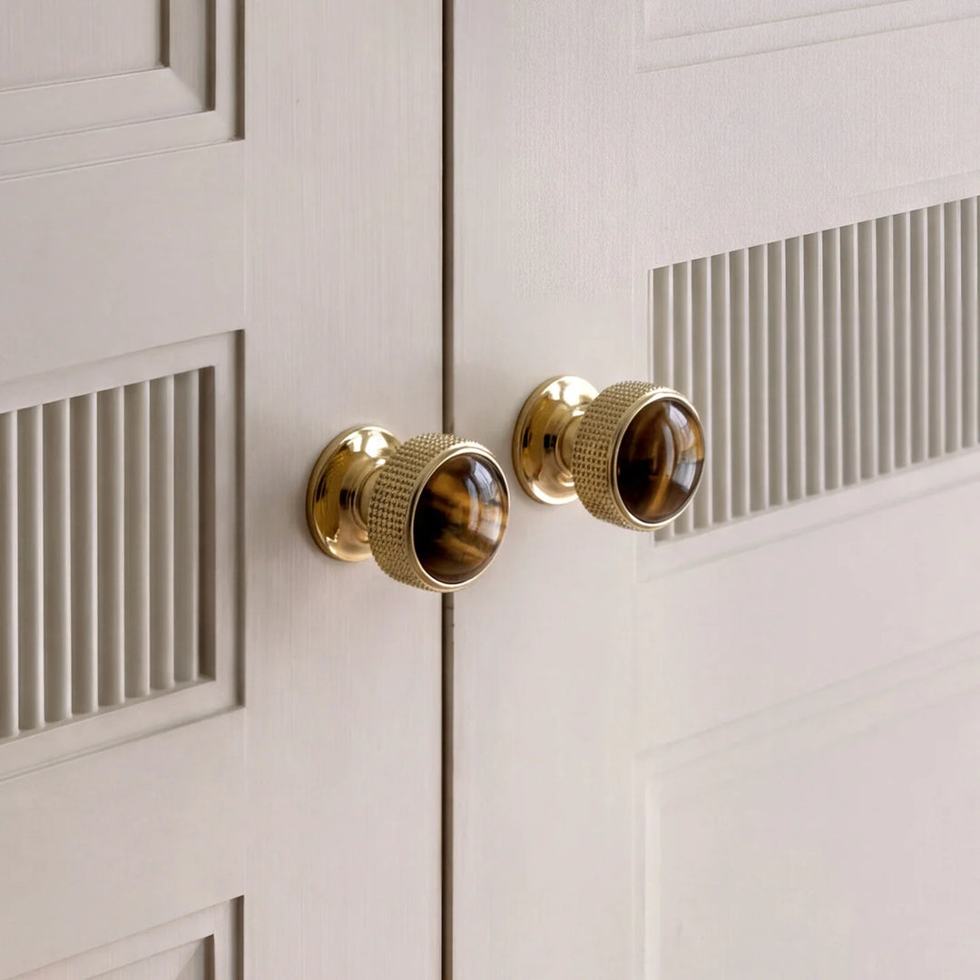 Tiger Eye Brass Cabinet Knobs installed on cabinet doors