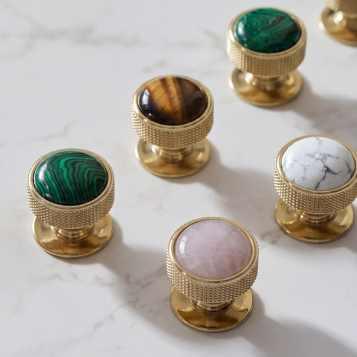 Brass Gemstone Cabinet Knobs collection on marble