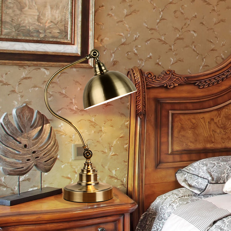 Bronze Gooseneck Task Light on a bedside table