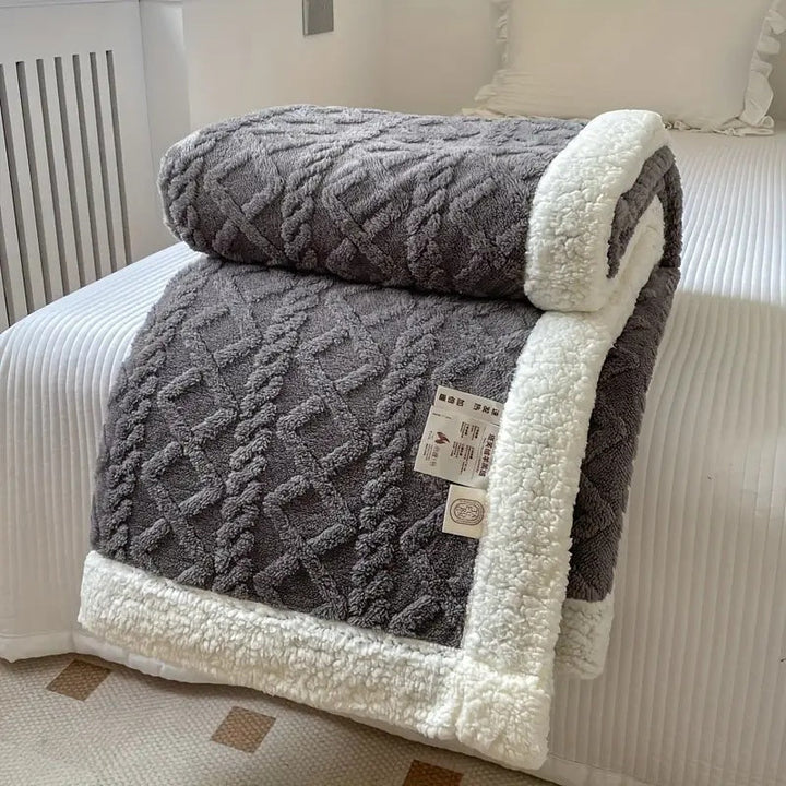 Charcoal Brushed Sherpa Fleece Throw rolled to show both faces