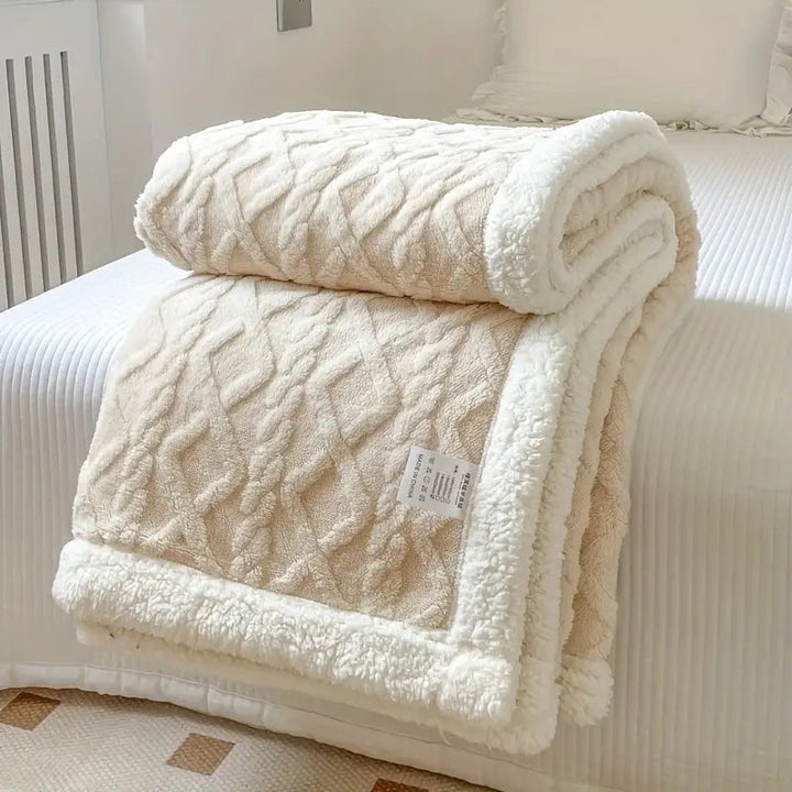 Creamy White Brushed Sherpa Fleece Throw rolled to show both faces