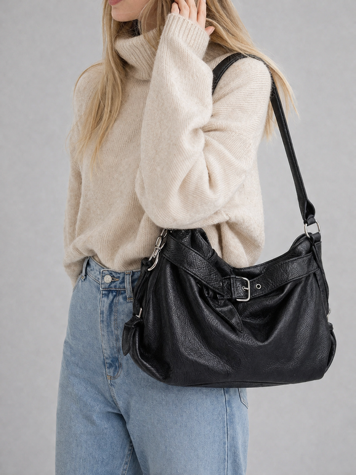 Black Buckle-Strap Vegan Leather Hobo Bag lifestyle with knit sweater