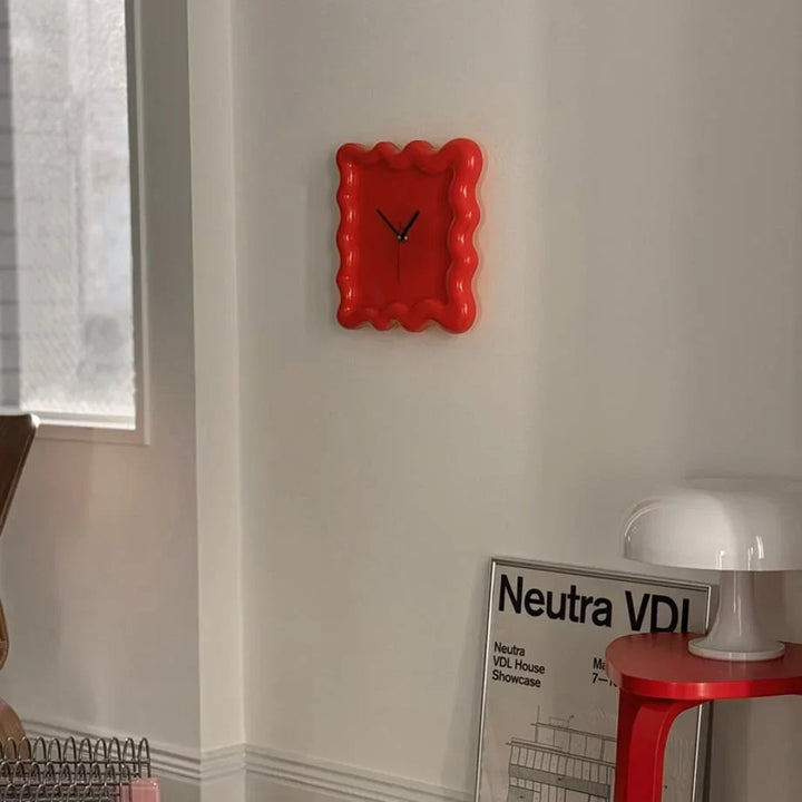 Glossy Melamine Squiggle Wall Clock on wall lifestyle